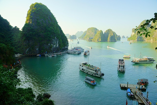 Halong Bay Junk Boat Tours: Complete Travel Guide for an Unforgettable Cruise Experience 2 Luxury cruise deck overlooking Halong Bay at sunset.