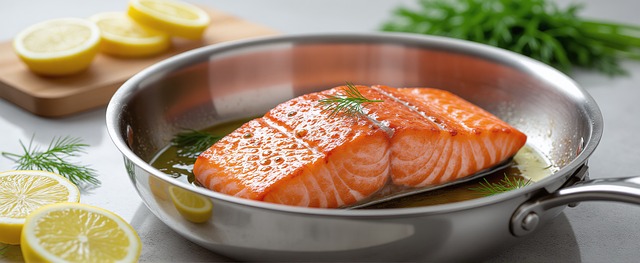 Pan-seared Alaska Pollock cooking in a skillet.